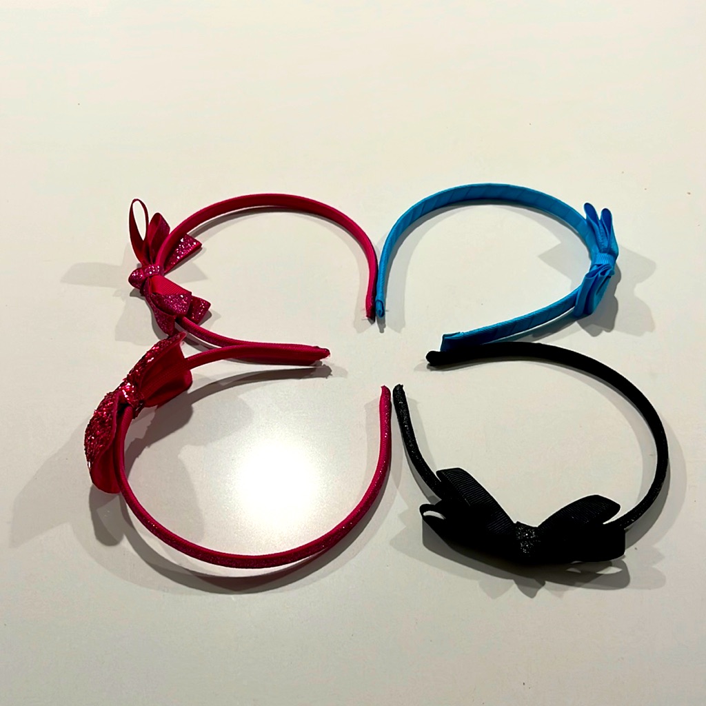 Four Head Bands With Bows